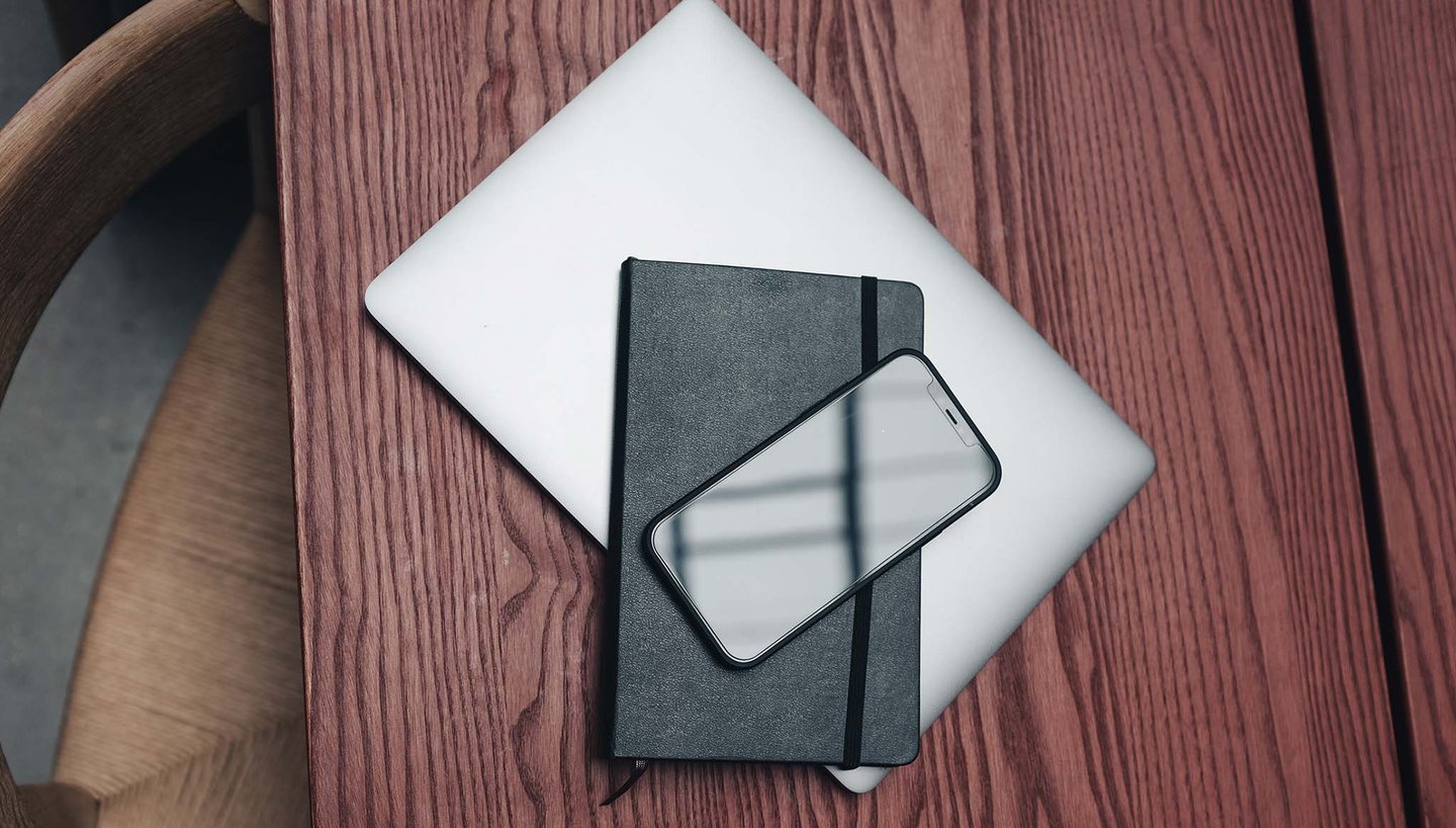macbook-phone-on-desk