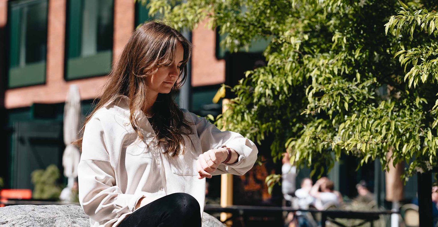 woman-looking-at-her-watch