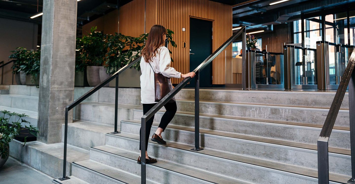 woman-walking-up-the-stairs