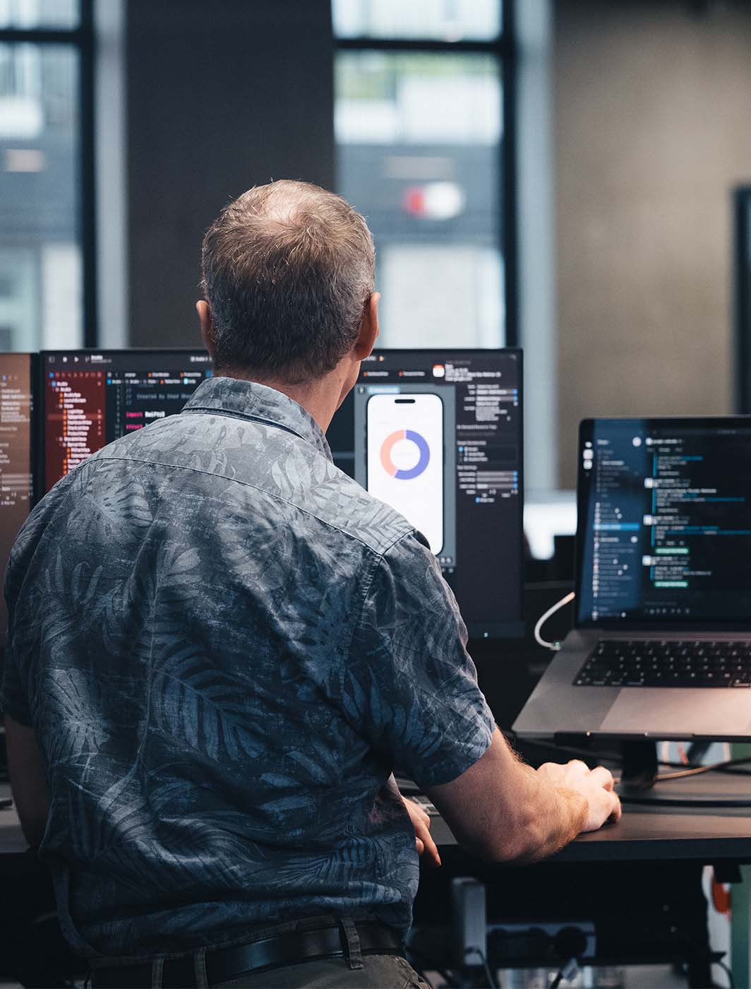 man-working-with-2-screens