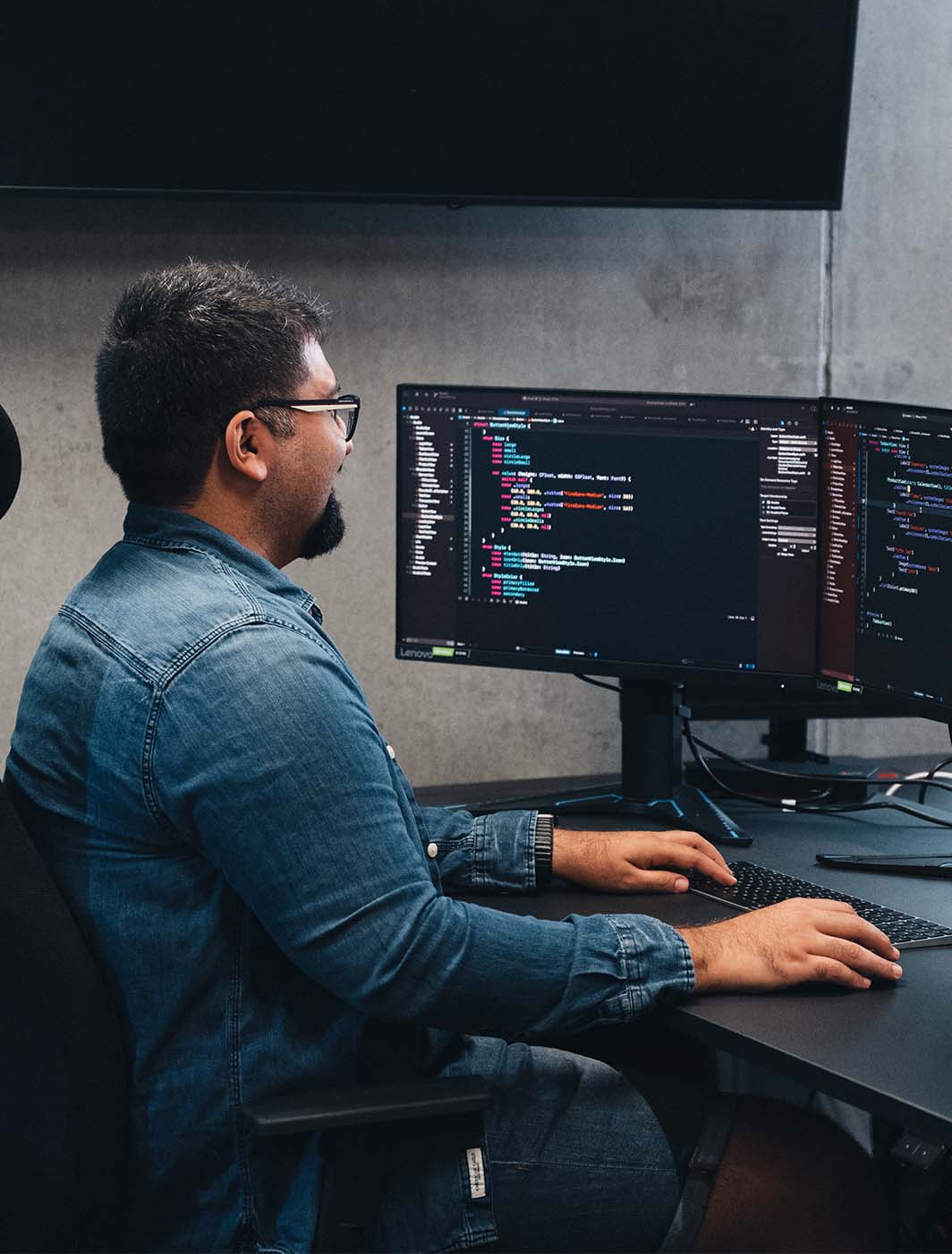 man-working-with-screens